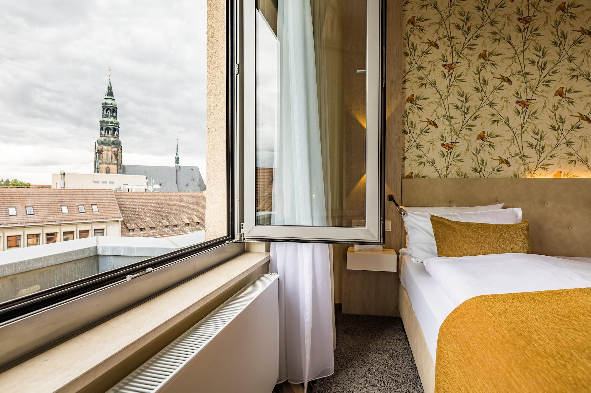 Hotel First